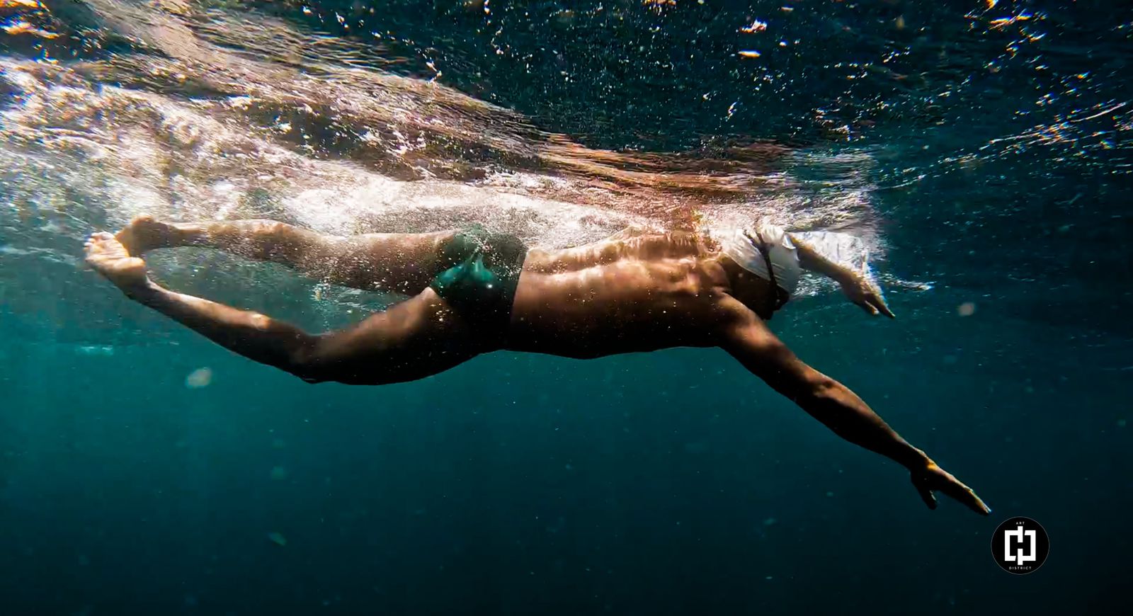 John Procope swimming underwater